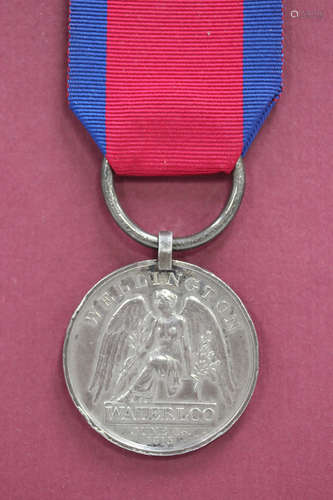 A Waterloo Medal 1815 to 'Robert Moore, Royal Artill.Drivers...