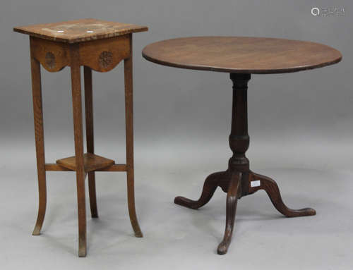 A 19th century oak tip-top wine table, on a tripod base, hei...