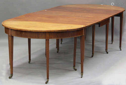 A George III mahogany 'D' end dining table, with crossbanded...