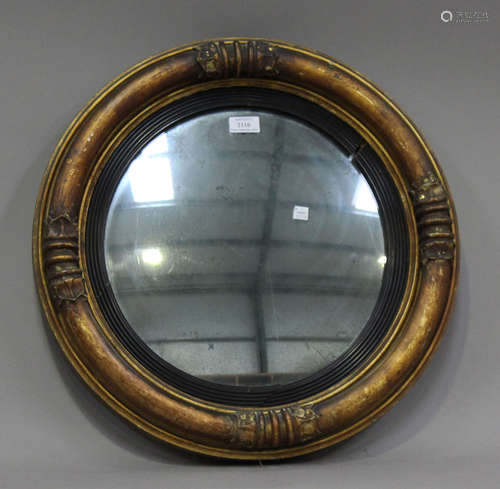 A 19th century giltwood circular convex wall mirror, diamete...