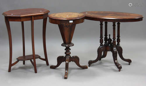 A late Victorian walnut games/work table, the top inlaid wit...