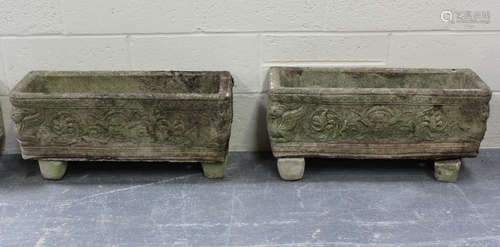 A pair of 20th century cast composition stone rectangular ga...