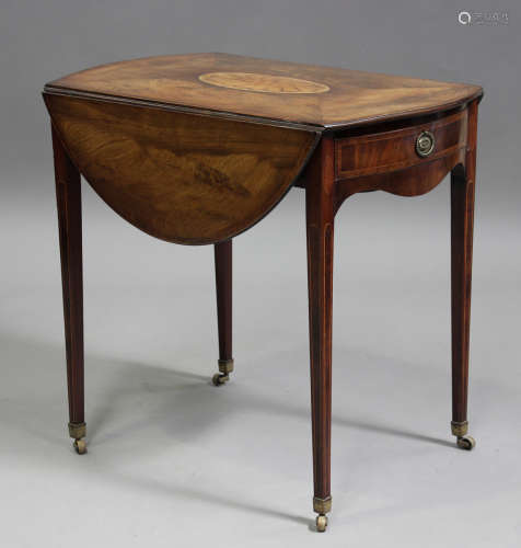 A George III Hepplewhite period mahogany oval Pembroke table...