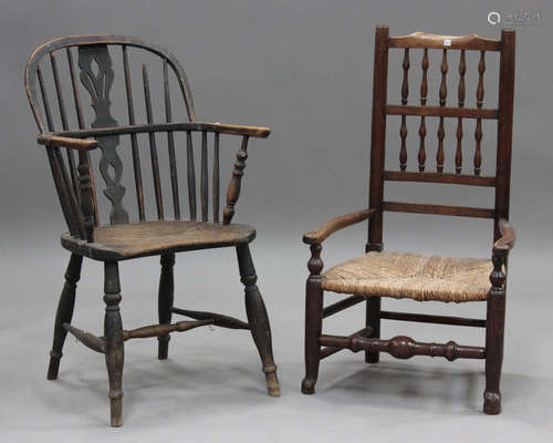 A 19th century ash and elm tub back Windsor armchair, height...