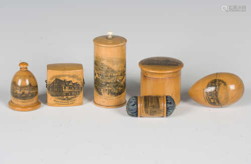 A group of six pieces of Mauchline ware, including a pin cus...