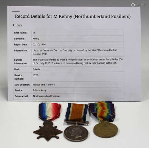 A 1914 Star to '9226 Pte M.Kenny. 1/North.D Fus.' and a 1914...