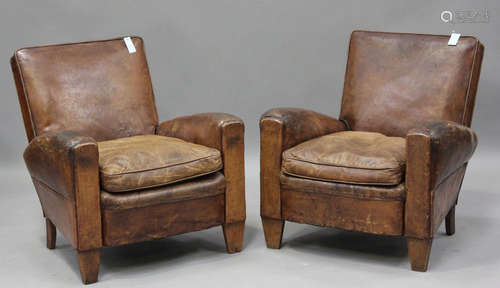 A pair of early 20th century French brown leather club armch...