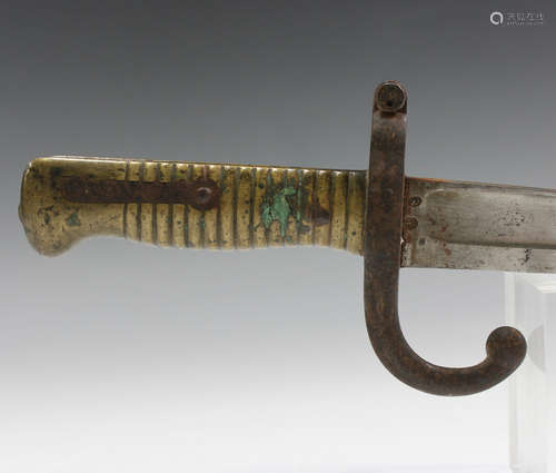 A French 1866 model chassepot bayonet with curved single-edg...