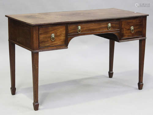 A late 19th century mahogany kneehole side table, fitted wit...