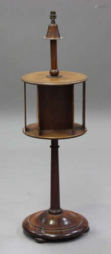 An early 20th century mahogany and anodized copper lamp stan...