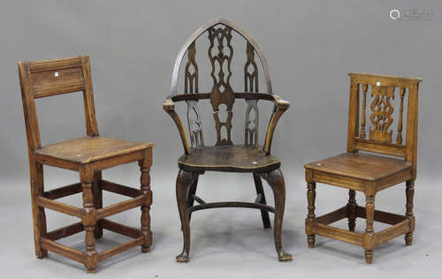 An early 20th century Gothic Revival ash and elm Windsor arm...