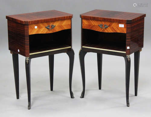 A pair of mid-20th century French macassar and kingwood beds...