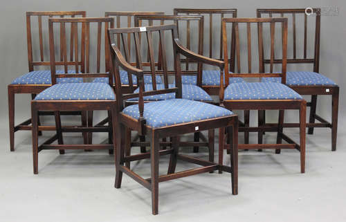 A set of eight George III mahogany rail back dining chairs, ...