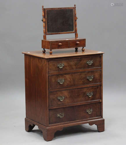 A 19th century mahogany chest of four drawers, on bracket fe...