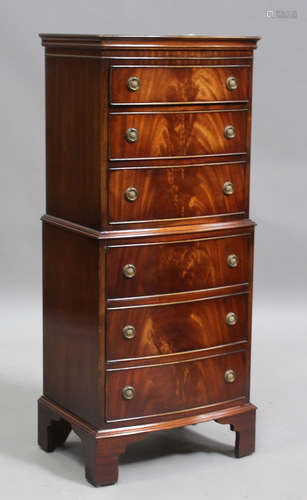 A late 20th century reproduction mahogany bowfront chest of ...