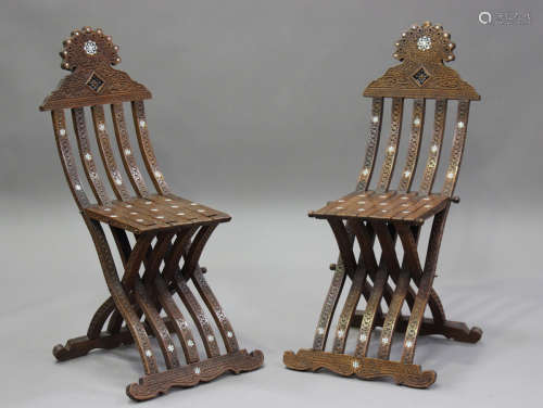 A pair of late 19th/early 20th century Middle Eastern walnut...