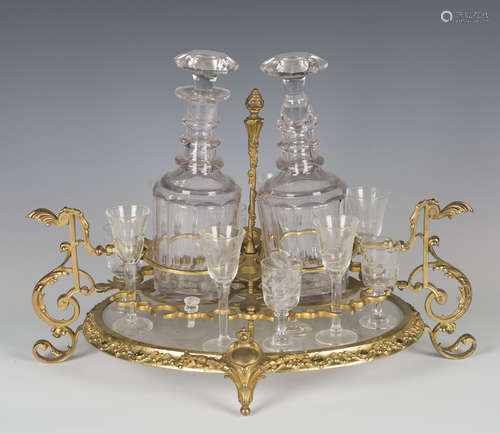 A 20th century French ormolu and cut glass liquor stand of o...