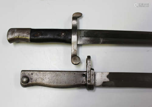 A Portuguese M1885 sword bayonet, Austrian-made, probably by...