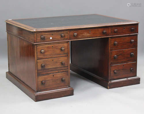 A mid-Victorian mahogany twin pedestal partners desk, the to...