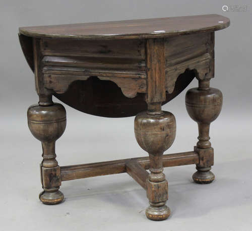 A 20th century Continental stained pine credence table, the ...