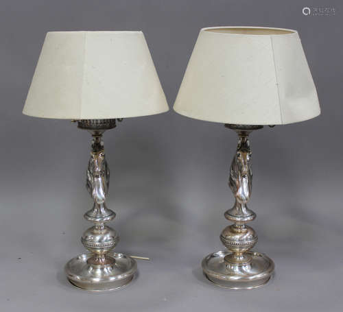 A pair of late 20th century silver plated cast metal table l...