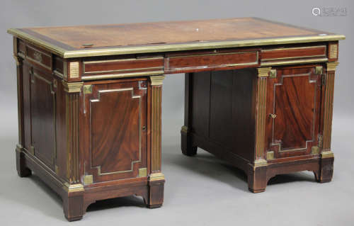 A 20th century French Empire style figured mahogany twin ped...