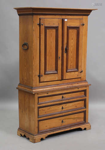 A late 19th century Continental pine side cabinet, the mould...