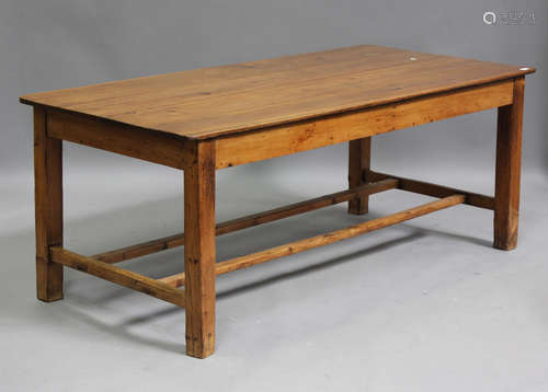 An early 20th century cherry and stained pine farmhouse tabl...