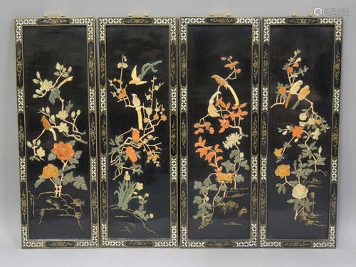 A set of four late 20th century Chinese lacquer panels with ...