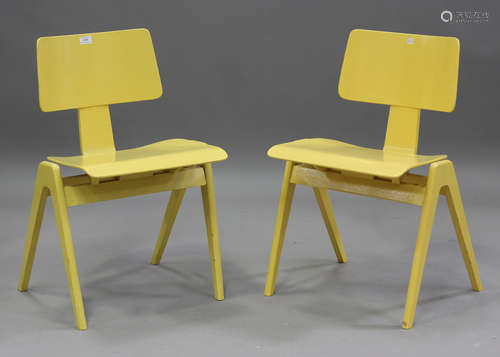 A pair of mid-20th century yellow painted 'Hillestak' chairs...