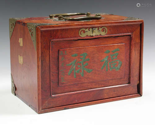 An early 20th century Chinese bone and bamboo mahjong set, w...