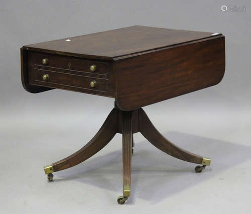 A Regency mahogany single pedestal Pembroke table, fitted wi...