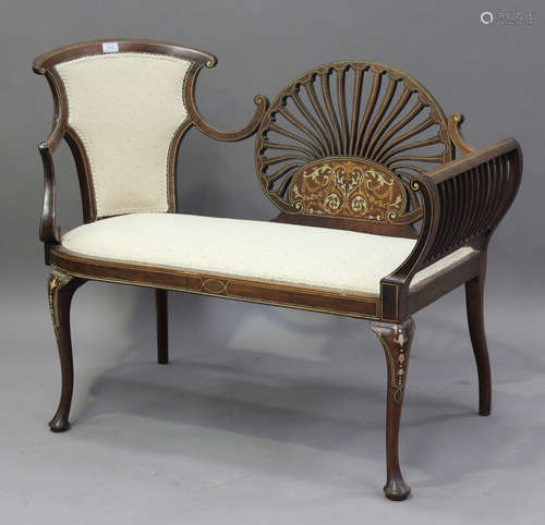 An Edwardian Neoclassical Revival mahogany salon settee, the...