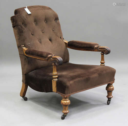 An early Victorian walnut framed gentleman's armchair with f...