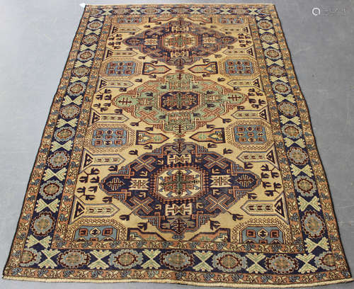 A Shirvan design rug, early/mid-20th century, the cream fiel...