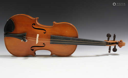 A violin, bearing interior label detailed 'Breton Brevette D...