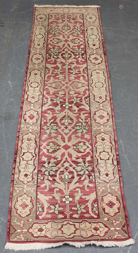 A flatweave runner, late 20th century, the pink field with o...