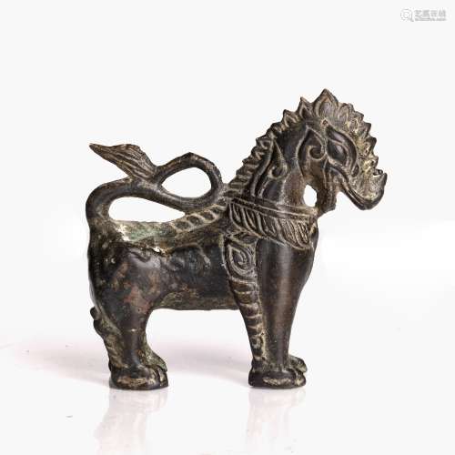 Bronze figure of a beast Burmese cast standing upright, with...
