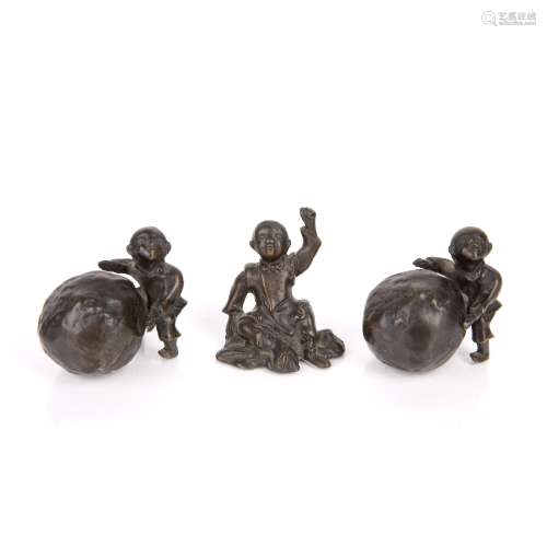 Small bronze model of a boy Chinese, 19th Century the seated...
