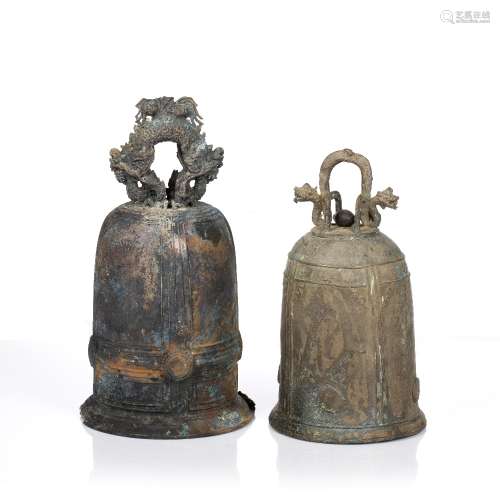 Two bronze temple bells Tibetan both with dragon handles and...