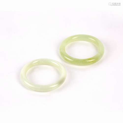 Two jadeite bangles Chinese of apple green colour, 8.5cm acr...