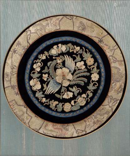 Kesi roundel embroidered silk depicting a phoenix amongst fl...