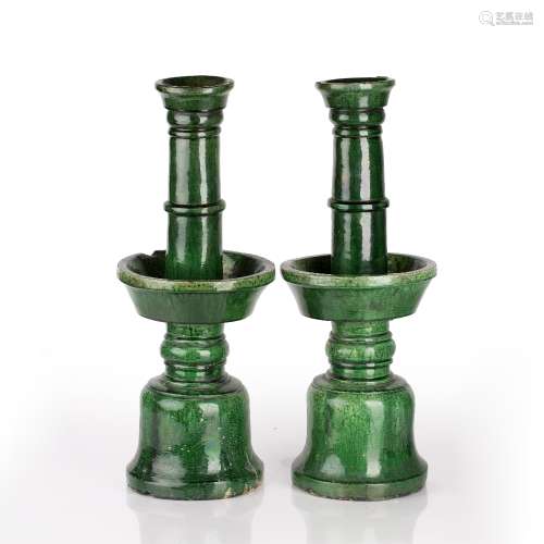 Pair of green glazed temple candle sticks Chinese, late 19th...