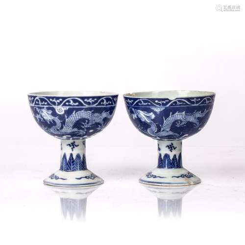 Pair of blue and white stem cups Chinese painted with dragon...