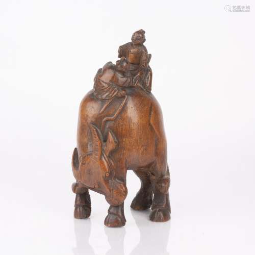 Root carving Chinese depicting two figures riding a water bu...