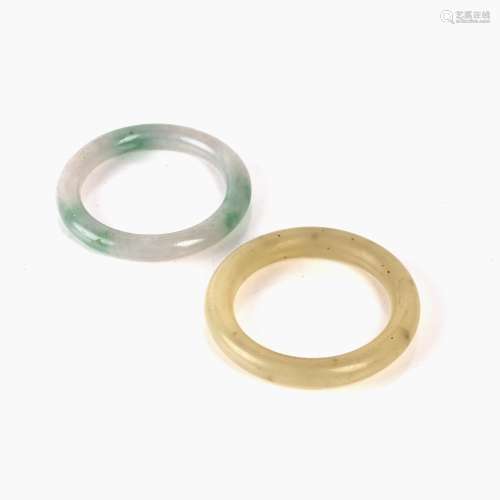 Pair of jade coloured bangles Chinese of a translucent colou...