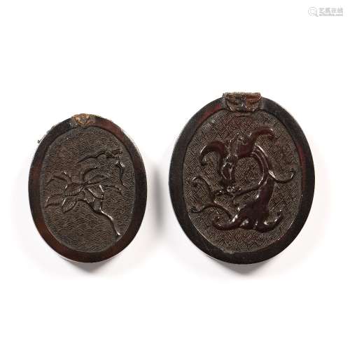 Two Zitan wood pendants Chinese, early 19th Century carved o...