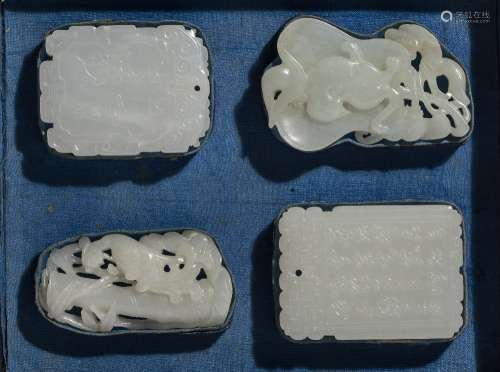 Collection of four white jade pendants Chinese, 18th Century...