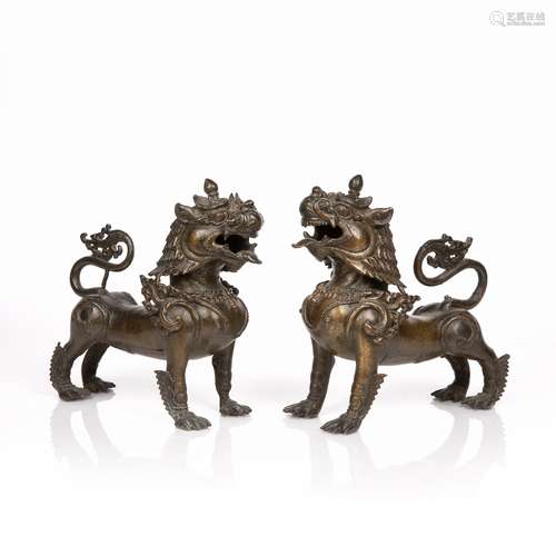 Pair of bronze lions Burmese, 19th Century standing four squ...