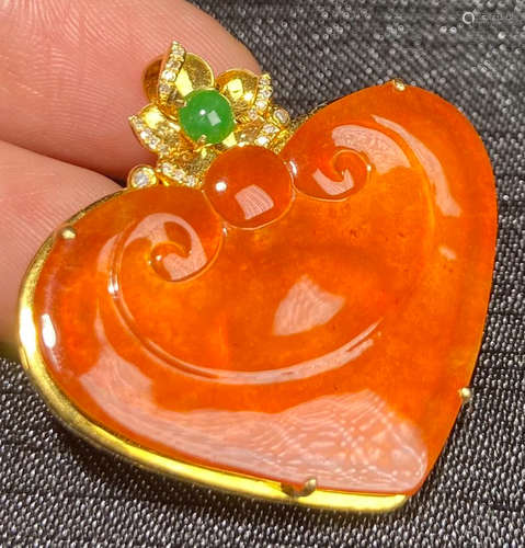 RED JADEITE CARVED RUYI PENDANT